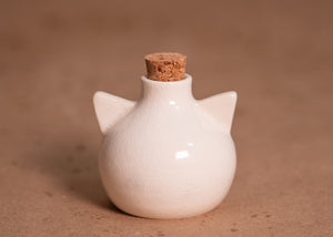 White Cat Potion bottle