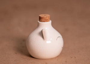 White Cat Potion bottle