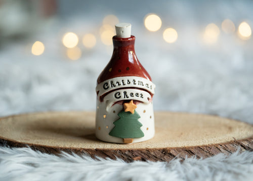 Christmas Cheer in a bottle with gold accents