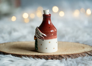 Christmas Cheer in a bottle with gold accents