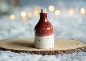 Christmas Cheer in a bottle with gold accents